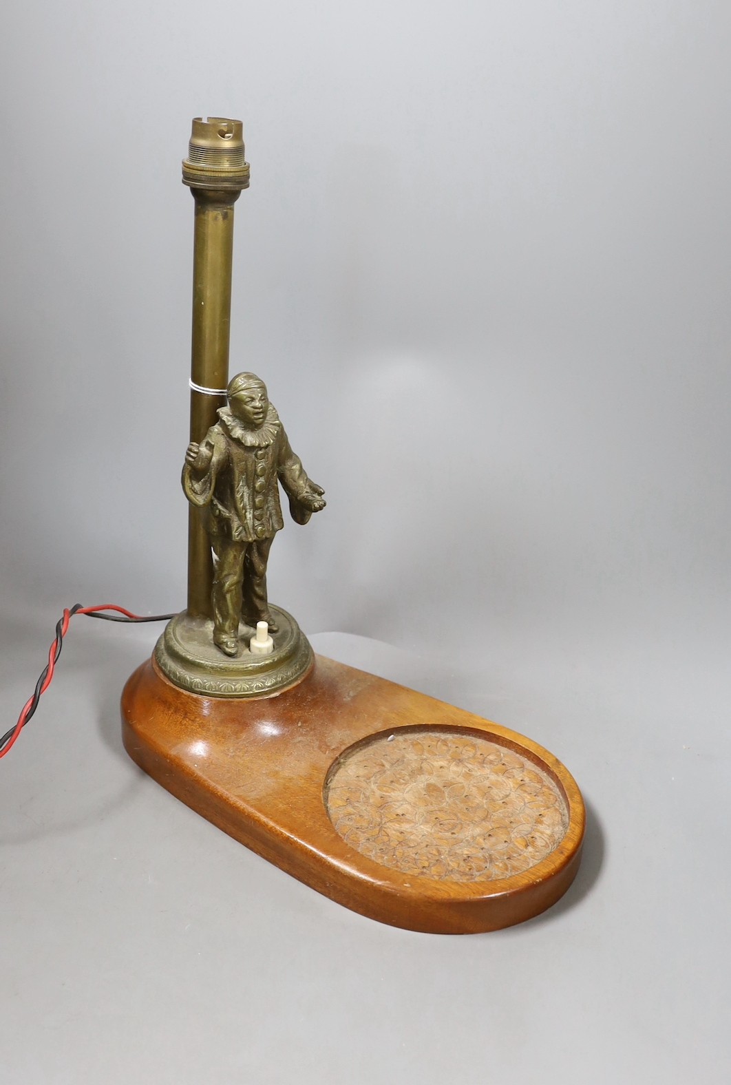 A brass figural ‘Pierrot’ table lamp